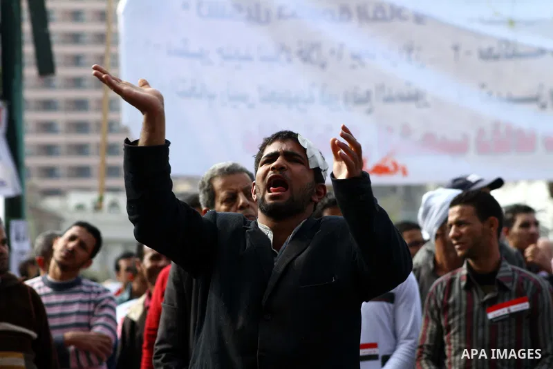 Egyptian protesters attend Friday prayers during a demonstration in Tahrir Square, in Cairo, Egypt, Friday, Dec. 2, 2011. Islamists appear to have taken a strong majority of seats in the first round of Egypt's first parl...