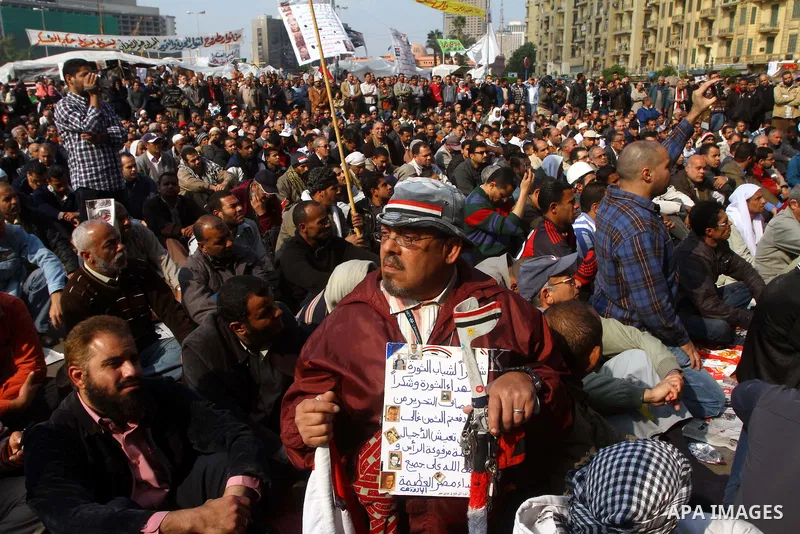 Egyptian protesters attend a demonstration in Tahrir Square, in Cairo, Egypt, Friday, Dec. 2, 2011. Islamists appear to have taken a strong majority of seats in the first round of Egypt's first parliamentary vote since H...