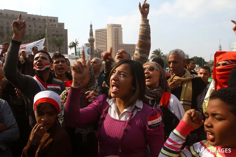 Egyptian protesters attend a demonstration in Tahrir Square, in Cairo, Egypt, Friday, Dec. 2, 2011. Islamists appear to have taken a strong majority of seats in the first round of Egypt's first parliamentary vote since H...