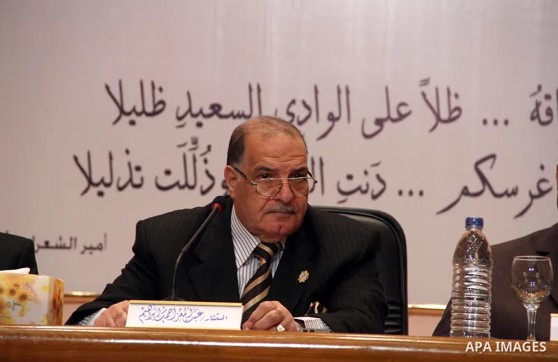 Abdel Moez Ibrahim (C), head of Egypt's High Judicial Committee for Elections, gives a news conference to announce the outcome of the elections in Cairo December 2, 2011. Turnout in the first round of Egypt's parliamenta...