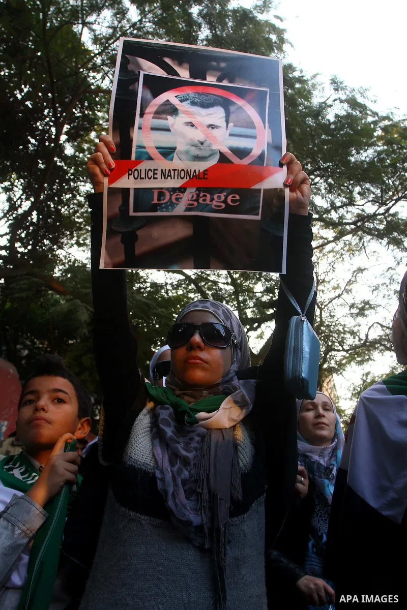 Syrians living in Egypt demonstrate against the recent actions of the Syrian government, in Cairo, Egypt on Dec 03,2011. Photo by Ashraf Amra