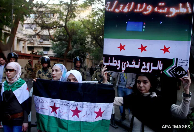 Syrians living in Egypt demonstrate against the recent actions of the Syrian government, in Cairo, Egypt on Dec 03,2011. Photo by Ashraf Amra