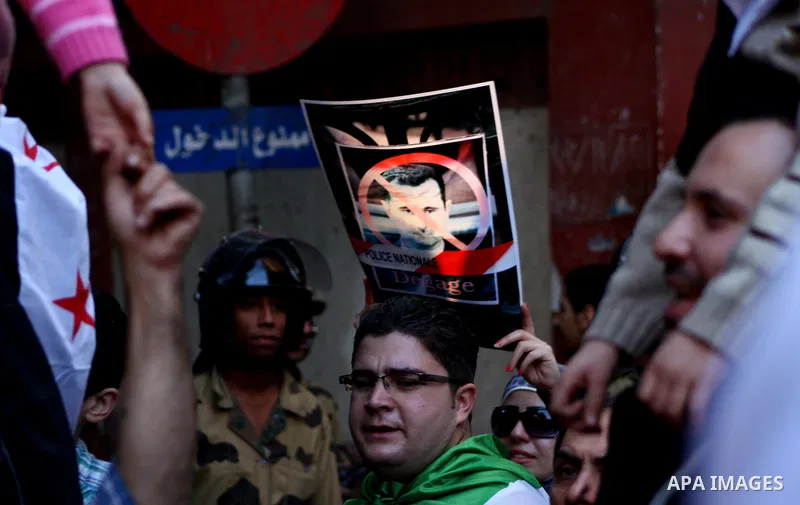 Syrians living in Egypt demonstrate against the recent actions of the Syrian government, in Cairo, Egypt on Dec 03,2011. Photo by Ashraf Amra