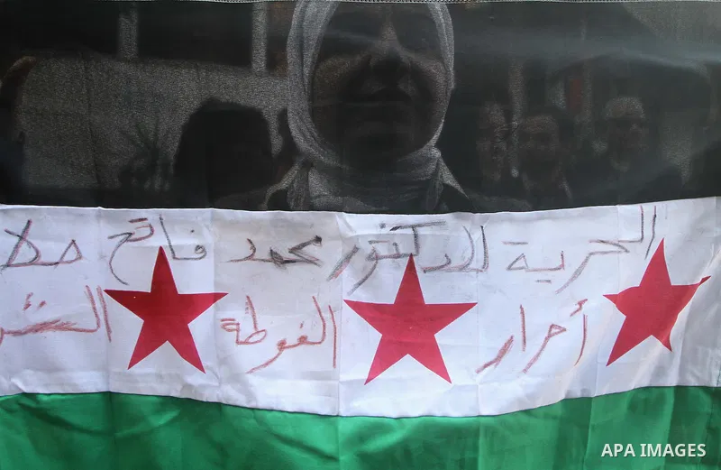 Syrians living in Egypt demonstrate against the recent actions of the Syrian government, in Cairo, Egypt on Dec 03,2011. Photo by Ashraf Amra