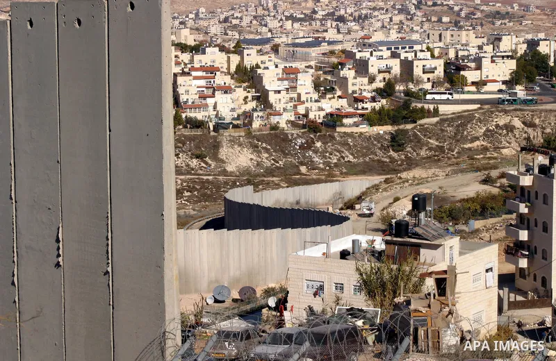Israeli separation barrier is seen near the Jewish settlement known to Israelis as Bezgat Zeav near Jerusalem Dec. 4, 2011. Photo by Mahfouz Abu Turk