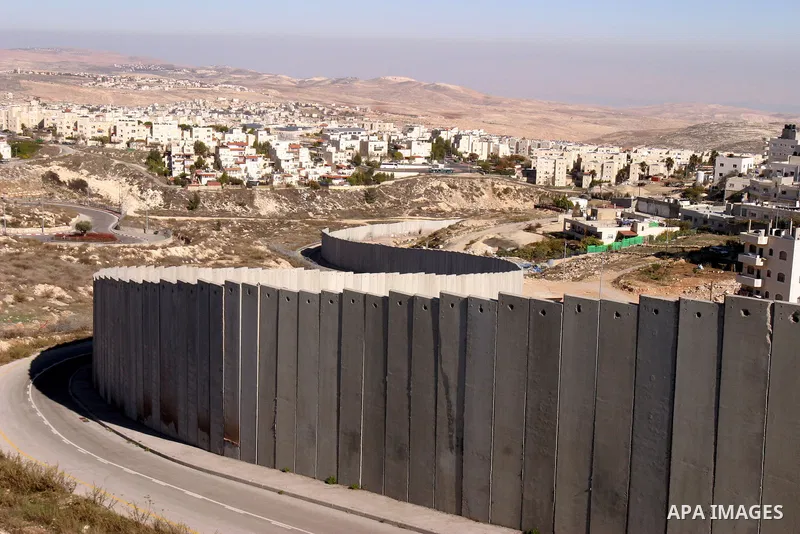 Israeli separation barrier is seen near the Jewish settlement known to Israelis as Bezgat Zeav near Jerusalem Dec. 4, 2011. Photo by Mahfouz Abu Turk