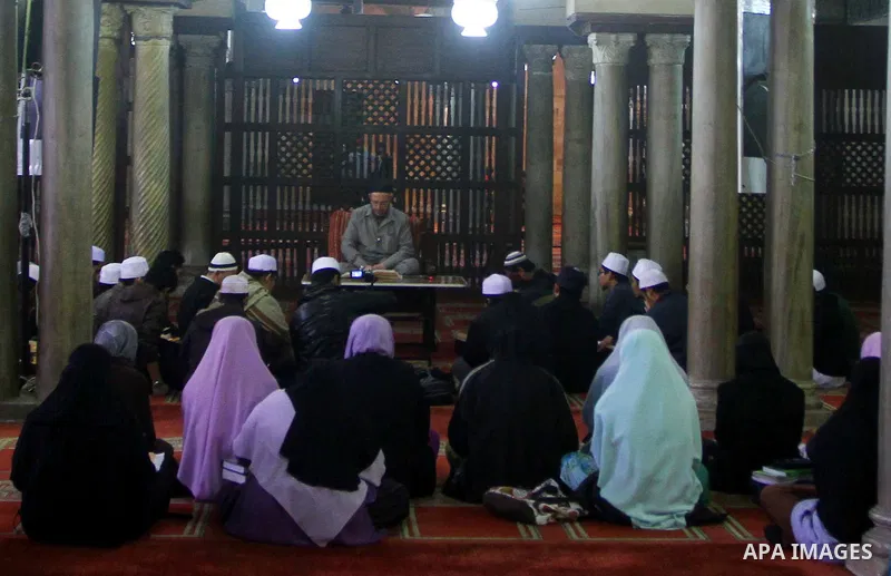 Indonesian Muslim students attend an Islamic religious course at Al-Azhar mosque in the old city of Cairo on December 4, 2011. Al-Azhar mosque, which was developed into one of the oldest Islamic universities, pays specia...