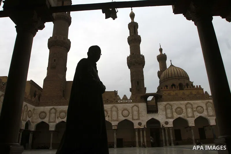 Muslims walk at the yard of Al-Azhar mosque in the old city of Cairo on December 4, 2011. Al-Azhar mosque, which was developed into one of the oldest Islamic universities, pays special attention to the Quranic sciences a...