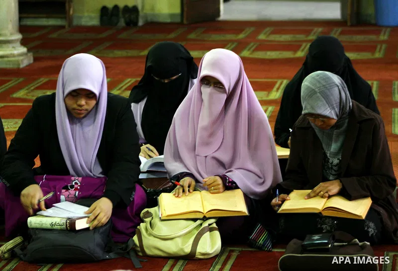 Indonesian Muslim students attend an Islamic religious course at Al-Azhar mosque in the old city of Cairo on December 4, 2011. Al-Azhar mosque, which was developed into one of the oldest Islamic universities, pays specia...