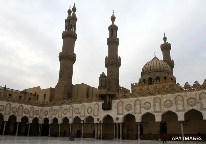 Muslims walk at the yard of Al-Azhar mosque in the old city of Cairo on December 4, 2011. Al-Azhar mosque, which was developed into one of the oldest Islamic universities, pays special attention to the Quranic sciences a...