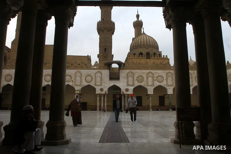 Muslims walk at the yard of Al-Azhar mosque in the old city of Cairo on December 4, 2011. Al-Azhar mosque, which was developed into one of the oldest Islamic universities, pays special attention to the Quranic sciences a...