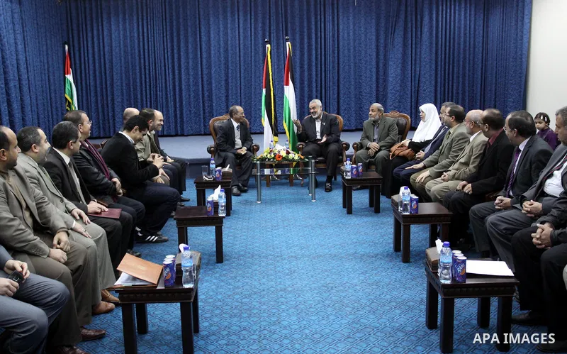 Palestinian prime minister in Gaza Strip, Ismail Haniya meets with a delegation from Arab Doctors Union headed by Osama Raslan at his office in Gaza city on Dec. 5,2011. The delegation is in an official visit to Gaza Str...