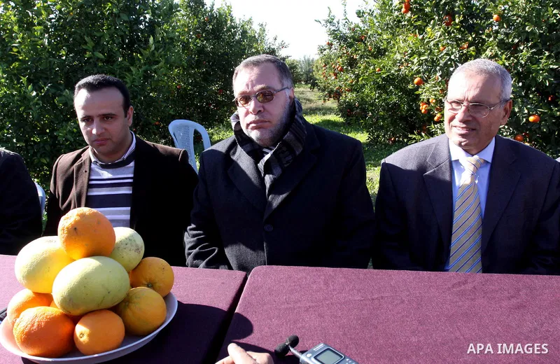 Palestinian Miinister of Agriculture, Mohammed al-Agha attends a celebration at farm during the annual harvesting season in Gaza city on Dec. 5,2011. The Ministry of Agriculture organised a celebration at the farm in the...