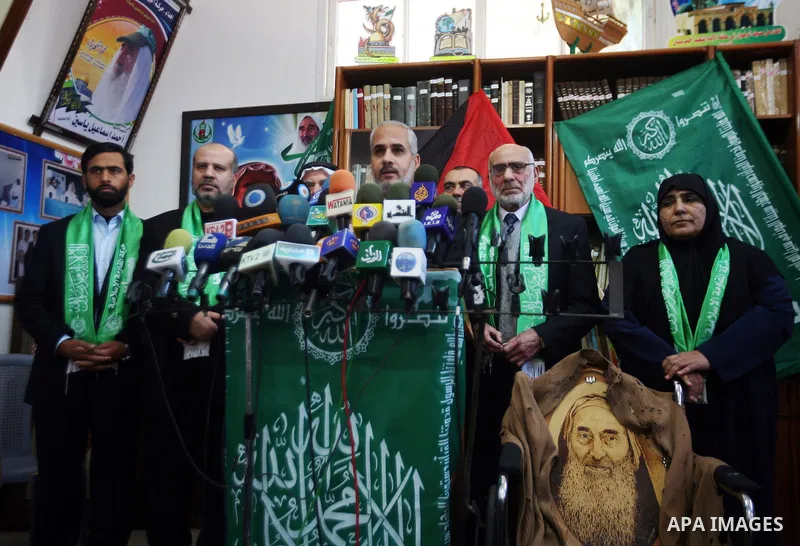 Palestinian Hamas leaders gather at the Hamas founder home, Ahmed Yaseen to announce the starting of the launch of celebrations marking the 24th anniversary of the Islamist movement's foundation, in Gaza City on Dec 5,20...