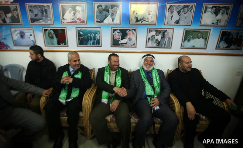 Palestinian Hamas leaders gather at the Hamas founder home, Ahmed Yaseen to announce the starting of the launch of celebrations marking the 24th anniversary of the Islamist movement's foundation, in Gaza City on Dec 5,20...