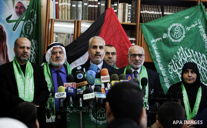 Palestinian Hamas leaders gather at the Hamas founder home, Ahmed Yaseen to announce the starting of the launch of celebrations marking the 24th anniversary of the Islamist movement's foundation, in Gaza City on Dec 5,20...