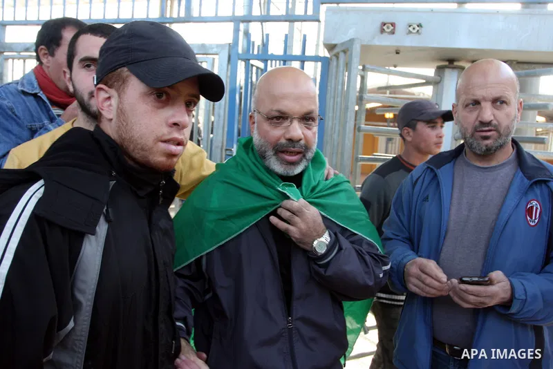 Palestinian lawmaker from Hamas , Ahmed Attoun, being welcomed by his friends at Kalandia checkpoint leading from Jerusalem to Ramallah, 06 December 2011, after his release from an Israeli jail. Atawni is a resident of E...