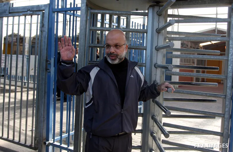 Palestinian lawmaker from Hamas , Ahmed Attoun passes through at Kalandia checkpoint leading from Jerusalem to Ramallah, 06 December 2011, after his release from an Israeli jail. Atawni is a resident of East Jerusalem an...