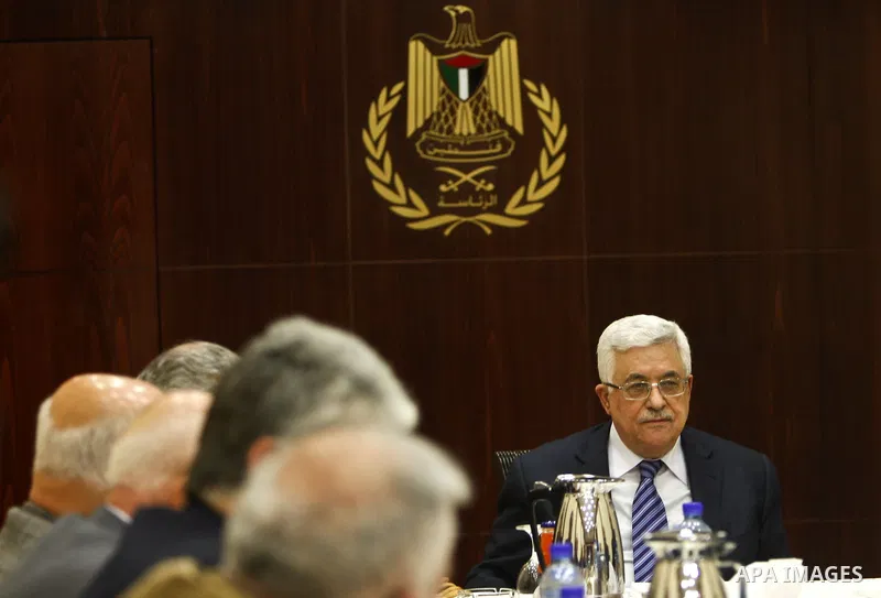Palestinian President Mahmoud Abbas attends a meeting of the Palestine Liberation Organization (PLO) executive committee at his compound in the West Bank city of Ramallah, Wednesday, Dec. 7, 2011. Photo by Issam Rimawi