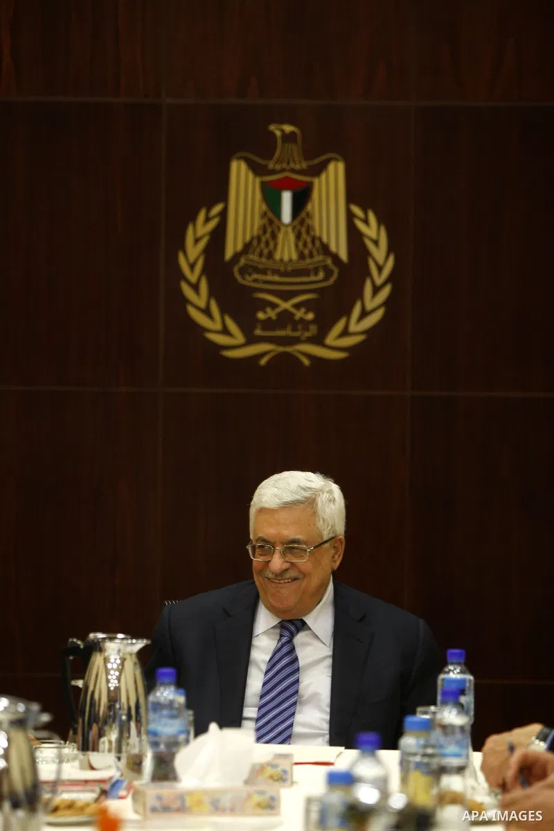 Palestinian President Mahmoud Abbas attends a meeting of the Palestine Liberation Organization (PLO) executive committee at his compound in the West Bank city of Ramallah, Wednesday, Dec. 7, 2011. Photo by Issam Rimawi