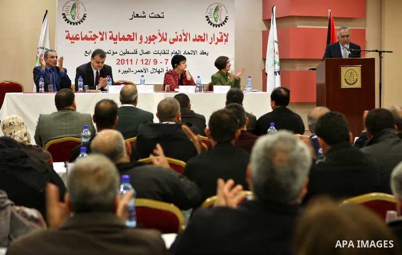 Palestinian Prime Minister, Salam Fayyad delivers speech during the Fourth Conference of the General Federation of Trade Unions of Palestine in the West Bank city of Ramallah on Dec. 8,2011. Photo by Mustafa Abu Dayeh