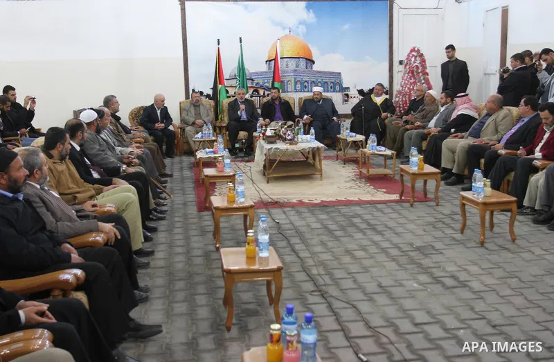 Palestinian prime minister in Gaza Strip, Ismail Haniya attends the wedding party of the freed Palestinian prisoner Mohammed Hamada from Jerusalem, who released from an Israeli jail during the swap with the Israeli soldi...