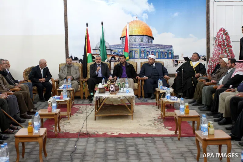 Palestinian prime minister in Gaza Strip, Ismail Haniya attends the wedding party of the freed Palestinian prisoner Mohammed Hamada from Jerusalem, who released from an Israeli jail during the swap with the Israeli soldi...