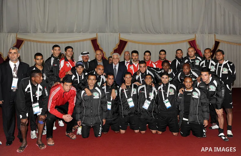 Palestinian President Mahmoud Abbas (Abu Mazen) visits the members of Palestinian mission for Olympic Games in Qatar, in Qatar on Dec. 8,2011. Photo by Thaer Ganaim