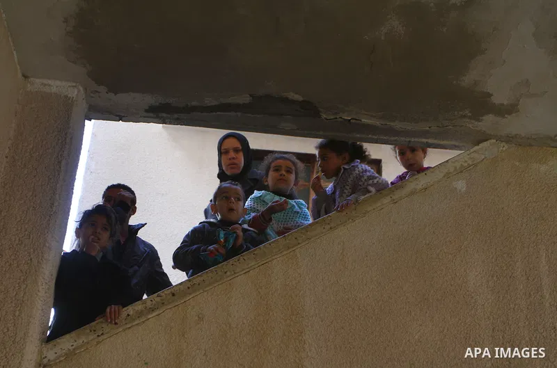 Relatives mourns during the funeral of Palestinian Bahjat Al-Zalan, who was killed in a blast from an Israeli air strike on a nearby Hamas training camp in Gaza City December 9, 2011. Violence across the Israeli-Gaza bor...