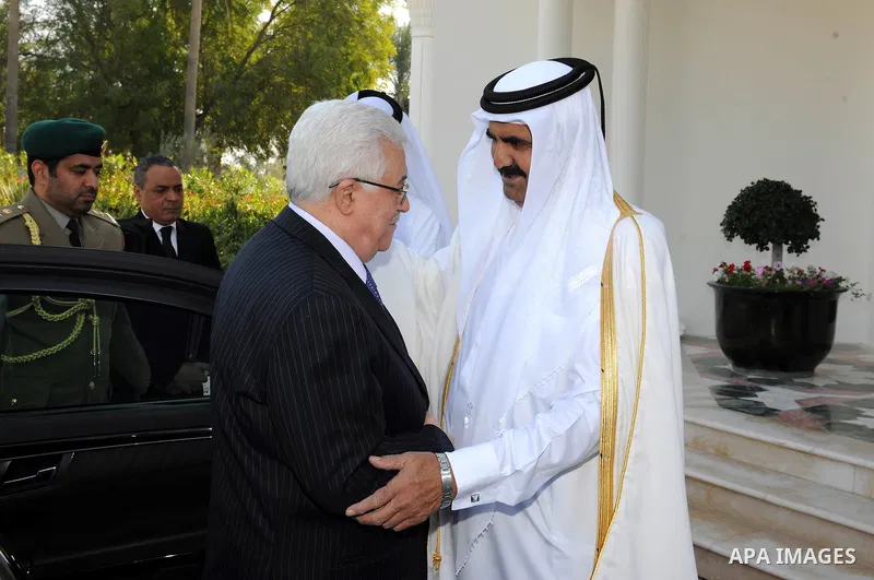 Palestinian President Mahmoud Abbas (Abu Mazen) meets with the emir of Qatar Sheikh Hamad bin Khalifa al-Thani, in Qatar on Dec. 9,2011. Photo by Thaer Ganaim