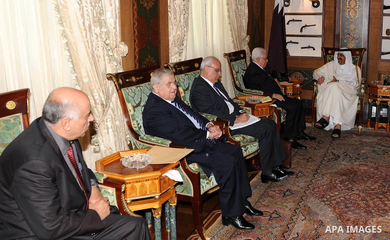 Palestinian President Mahmoud Abbas (Abu Mazen) meets with the emir of Qatar Sheikh Hamad bin Khalifa al-Thani, in Qatar on Dec. 9,2011. Photo by Thaer Ganaim