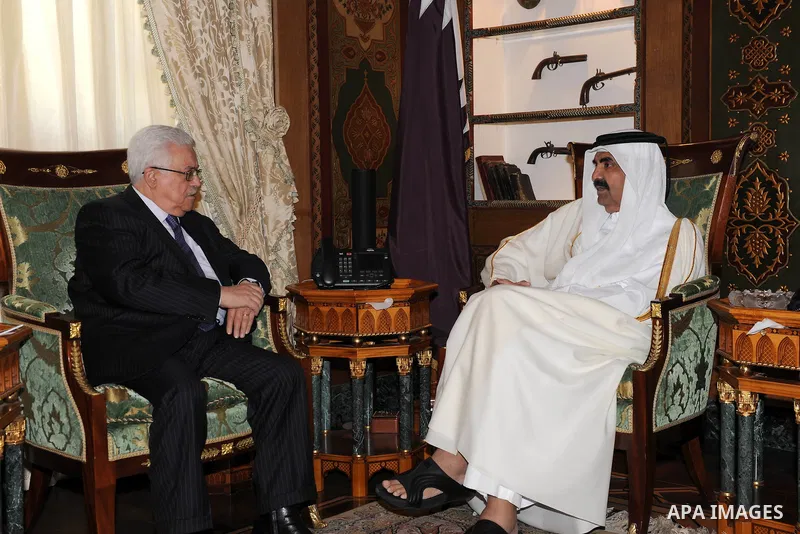 Palestinian President Mahmoud Abbas (Abu Mazen) meets with the emir of Qatar Sheikh Hamad bin Khalifa al-Thani, in Qatar on Dec. 9,2011. Photo by Thaer Ganaim