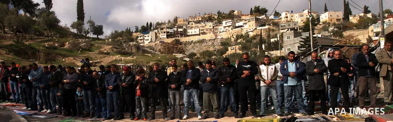 Palestinians attend Friday prayers at the protest tent in the Silwan neighborhood in East Jerusalem on Dec. 9,2011 as Palestinian protesters gather for a demonstration. Photo by Mahfouz Abu Turk
