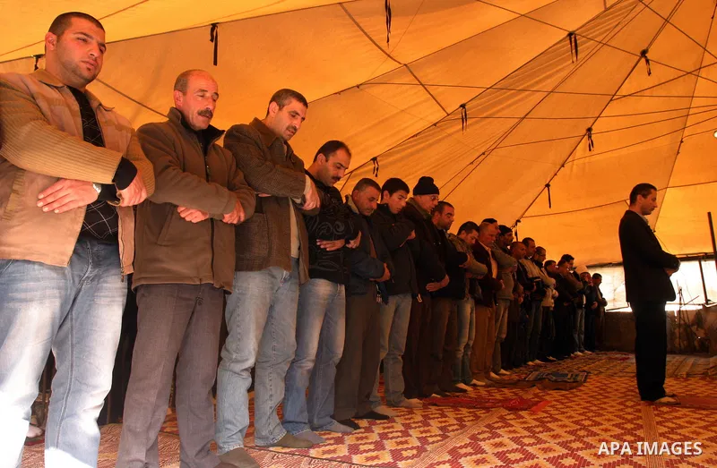 Palestinians attend Friday prayers at the protest tent in the Silwan neighborhood in East Jerusalem on Dec. 9,2011 as Palestinian protesters gather for a demonstration. Photo by Mahfouz Abu Turk