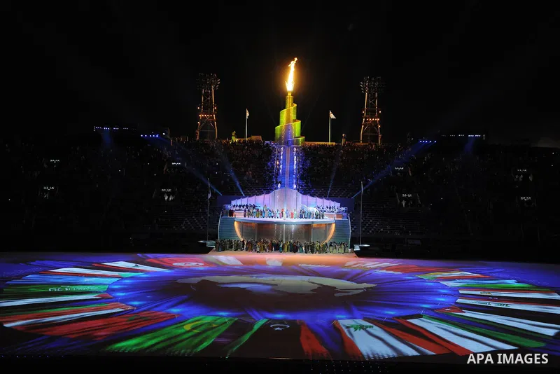 Fireworks illuminate Sheikh Khalifa stadium during the opening ceremony of the pan-Arab Games in the Qatari capital Doha on December 9, 2011. More than 5,000 Arab athletes are participating in the Arab games from Decembe...