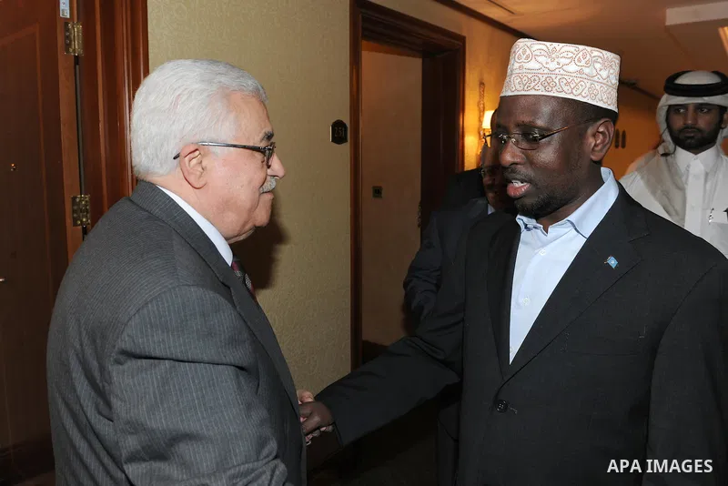 Palestinian President, Mahmoud Abbas (Abu Mazen), meets with Somali President, Sharif Sheikh Ahmed, in the Qatari capital Doha on Dec.10, 2011. Photo by Thaer Ganaim