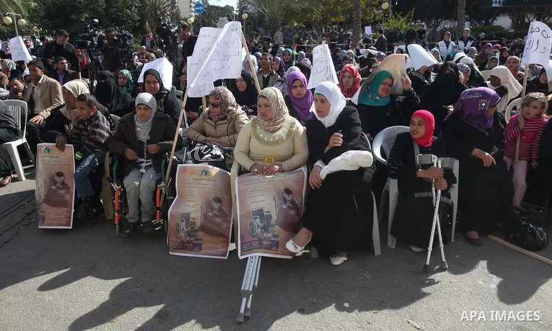 Palestinians Disabled take part in a protest in front of the Palestinian Legislative Council in Gaza City on Dec. 10, 2011. Photo by Yaser Fathi
