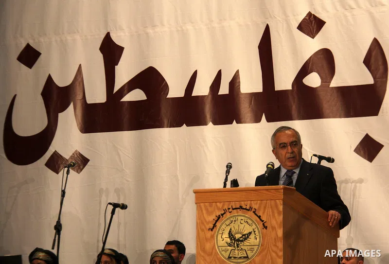 Palestinian Prime Minister Salam Fayyad speaks during a celebration to honor volunteers in al-Najah University in the West Bank city of Nablus, Sunday , Dec. 11, 2011. Photo by Wagdi Eshtayah.