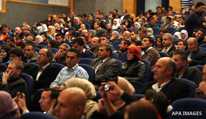Palestinian Prime Minister, Salam Fayyad attends (not seen) attends a celebration to honor volunteers in the West Bank city of Nablus, Sunday , Dec. 11, 2011. Photo by Mustafa Abu Dayeh