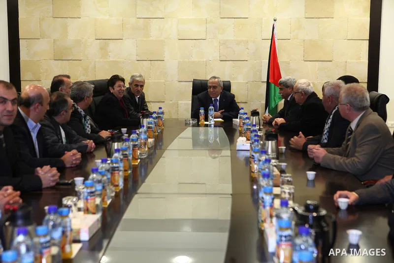 Palestinian Prime Minister, Salam Fayyad, receives Municipal Council of Ramallah and el- Nasera in the West Bank city of Ramallah, on Dec. 12, 2011. Photo by Mustafa Abu Dayeh