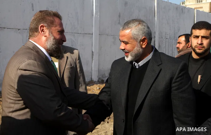 Palestinian Prime Minister in Gaza, Ismail Haniya, lays foundation stone for the reconstruction of yafa secondary school in the neighborhood Al tofah in Gaza city on Dec.13, 2011. Photo by Ashraf Amra