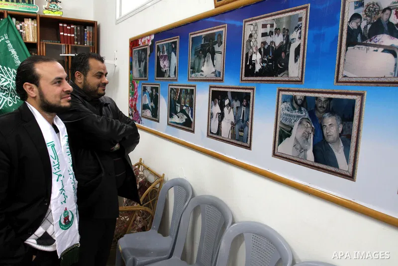 Members of al-Wa'ad team for Nasheed visit the home of Hamas leader Ahmed Yassen in preparation for the celebrations marking the Islamist movement's 24th anniversary, in Gaza city on Dec. 13,2011. The main celebration wi...