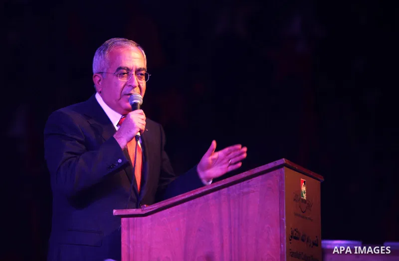 Palestinian Prime Minister, Salam Fayyad, during a ceremony of lighting the Christmas tree, in the West Bank City of Ramallah, On Dec.13, 2011. Photo by Mustafa Abu Dayeh
