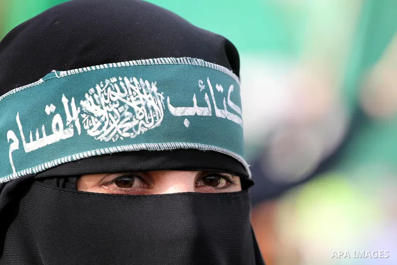 Thousands of Hamas supporters gather to celebrating marking the Islamist movement's 24nd anniversary at el-Qatiba yard in Gaza city on Dec 14, 2011. the Islamist movement of Hamas take over ruling at Gaza strip since Jun...