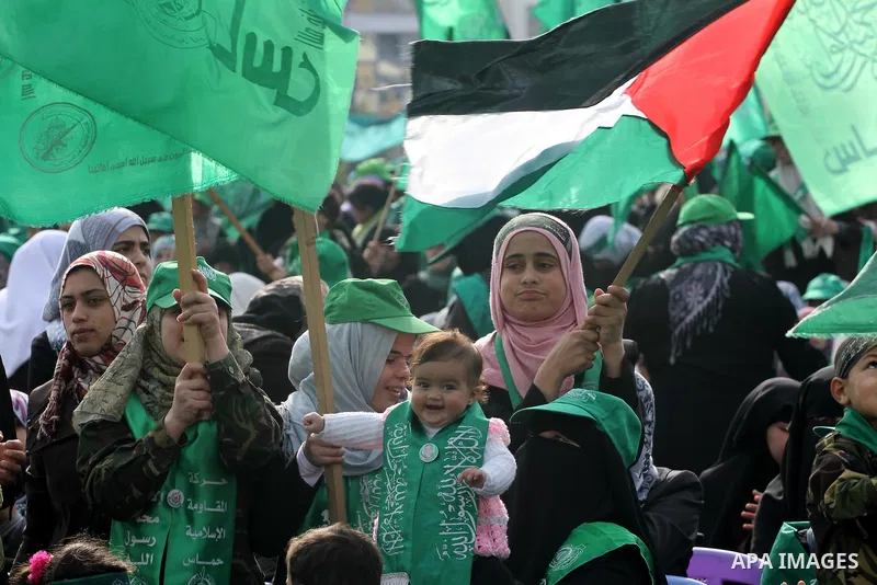 Thousands of Hamas supporters gather to celebrating marking the Islamist movement's 24nd anniversary at el-Qatiba yard in Gaza city on Dec 14, 2011. the Islamist movement of Hamas take over ruling at Gaza strip since Jun...