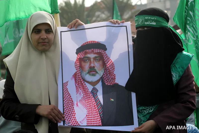 Thousands of Hamas supporters gather to celebrating marking the Islamist movement's 24nd anniversary at el-Qatiba yard in Gaza city on Dec 14, 2011. the Islamist movement of Hamas take over ruling at Gaza strip since Jun...
