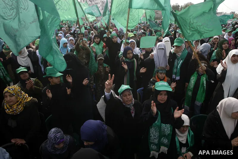 Thousands of Hamas supporters gather to celebrating marking the Islamist movement's 24nd anniversary at el-Qatiba yard in Gaza city on Dec 14, 2011. the Islamist movement of Hamas take over ruling at Gaza strip since Jun...