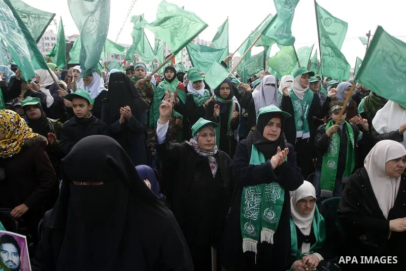 Thousands of Hamas supporters gather to celebrating marking the Islamist movement's 24nd anniversary at el-Qatiba yard in Gaza city on Dec 14, 2011. the Islamist movement of Hamas take over ruling at Gaza strip since Jun...