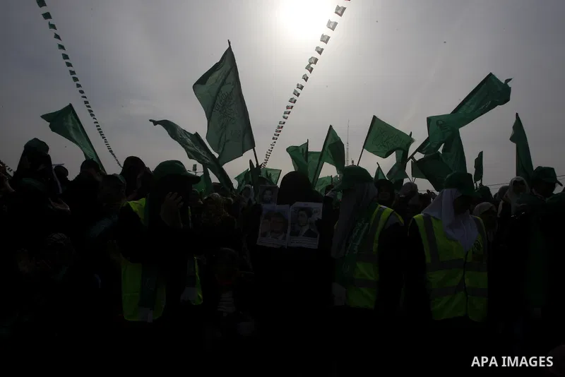 Thousands of Hamas supporters gather to celebrating marking the Islamist movement's 24nd anniversary at el-Qatiba yard in Gaza city on Dec 14, 2011. the Islamist movement of Hamas take over ruling at Gaza strip since Jun...