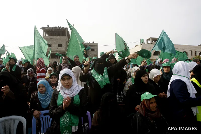 Thousands of Hamas supporters gather to celebrating marking the Islamist movement's 24nd anniversary at el-Qatiba yard in Gaza city on Dec 14, 2011. the Islamist movement of Hamas take over ruling at Gaza strip since Jun...